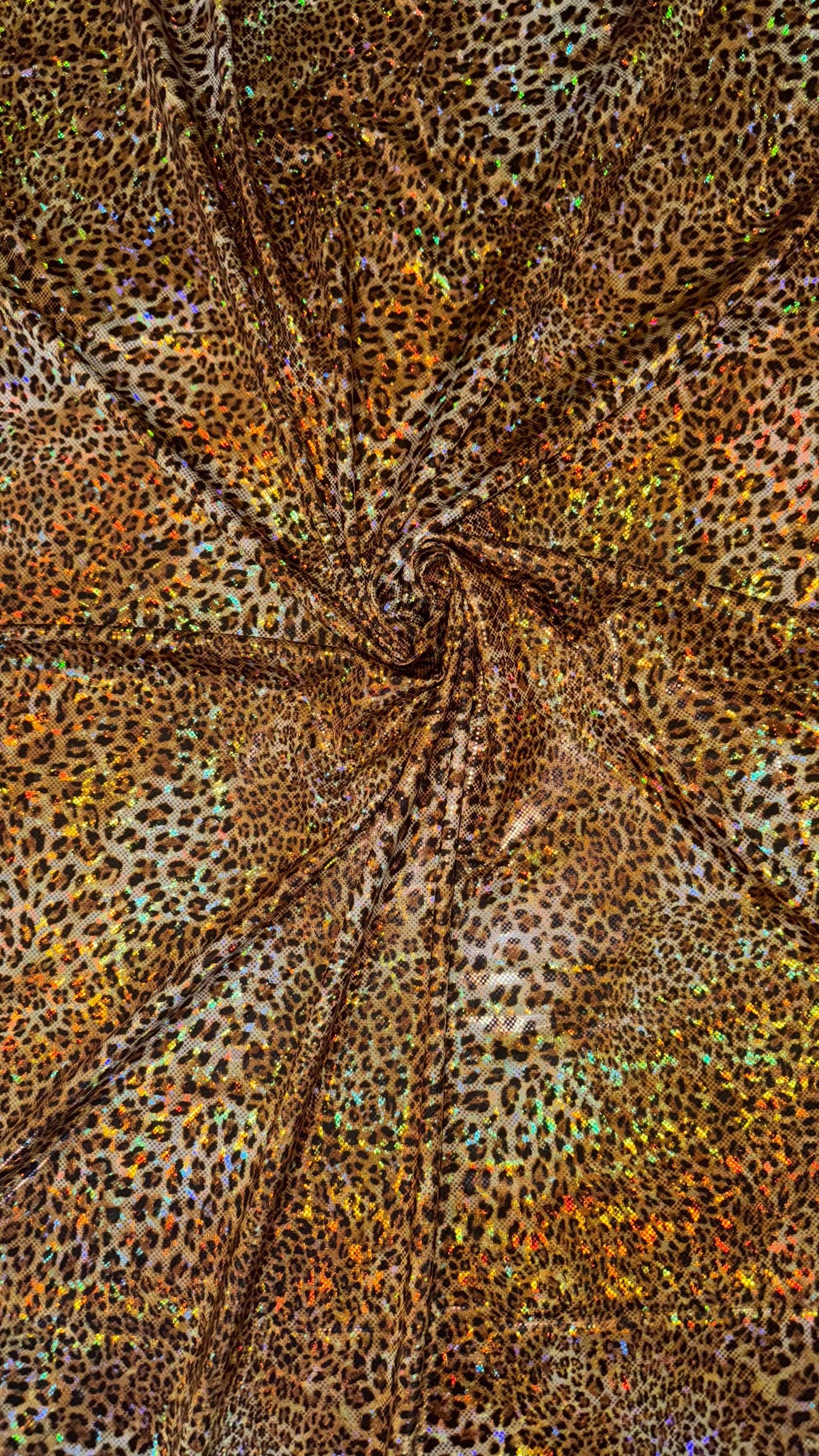 Cheetah hologram design New shattered glass hologram  metallic nylon spandex 4-way stretch 58/60” Sold by the YD. Ships worldwide from LA CA