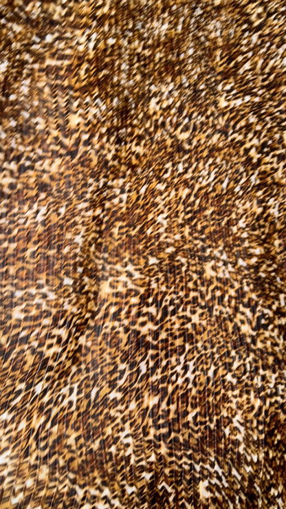 New Exotic leopard design print on high quality of multi chiffon pleated accordion style non stretch 58/60” Sold by the YD. Ships Worldwide