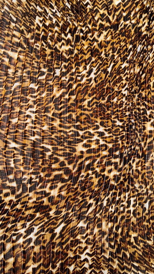 New Exotic leopard design print on high quality of multi chiffon pleated accordion style non stretch 58/60” Sold by the YD. Ships Worldwide