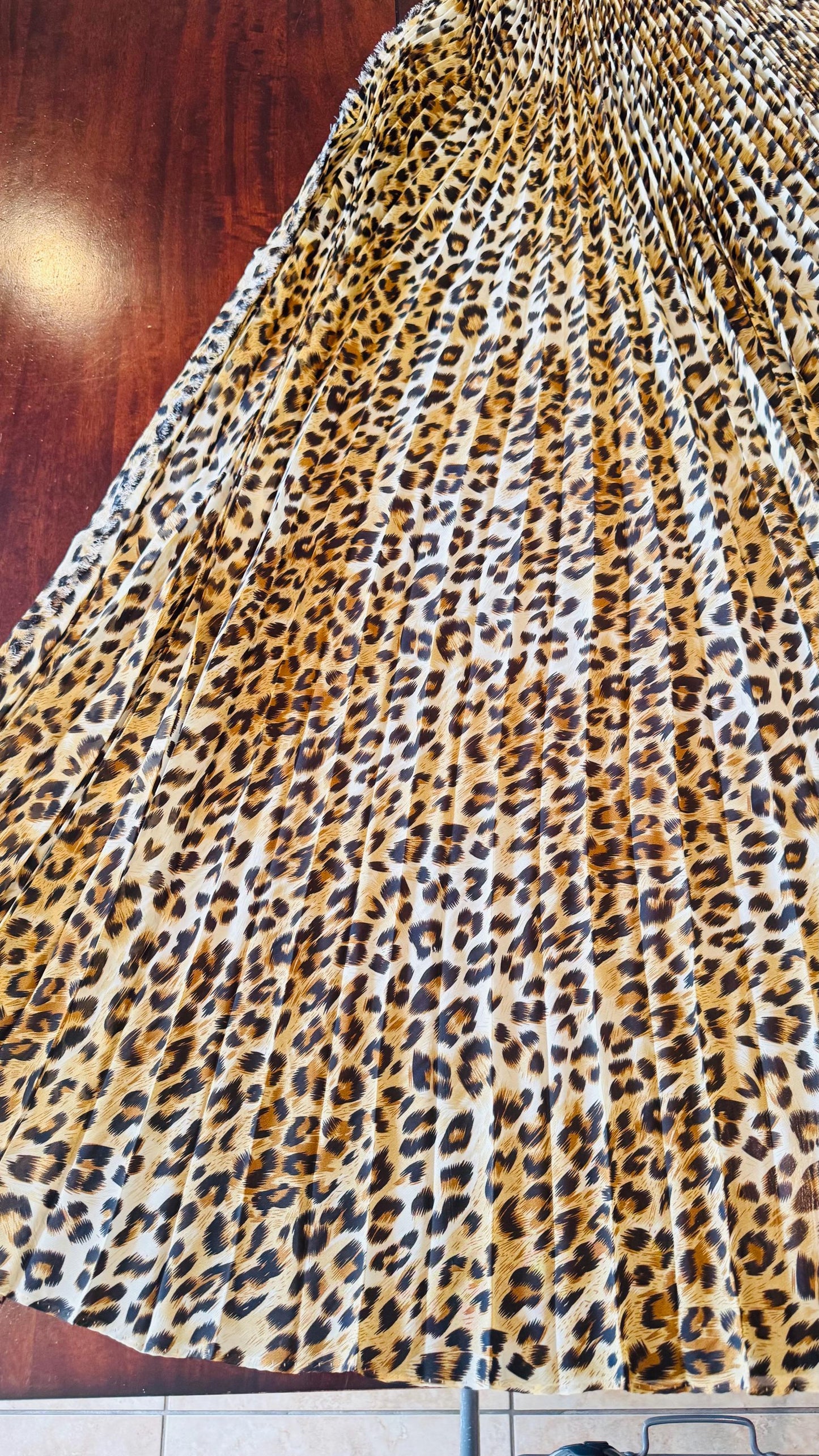 Sunburst pleated Silky Chiffon Cheetah Design non stretch 190” length by 60” width Sold by the PC. Ships worldwide from Los Angeles CA