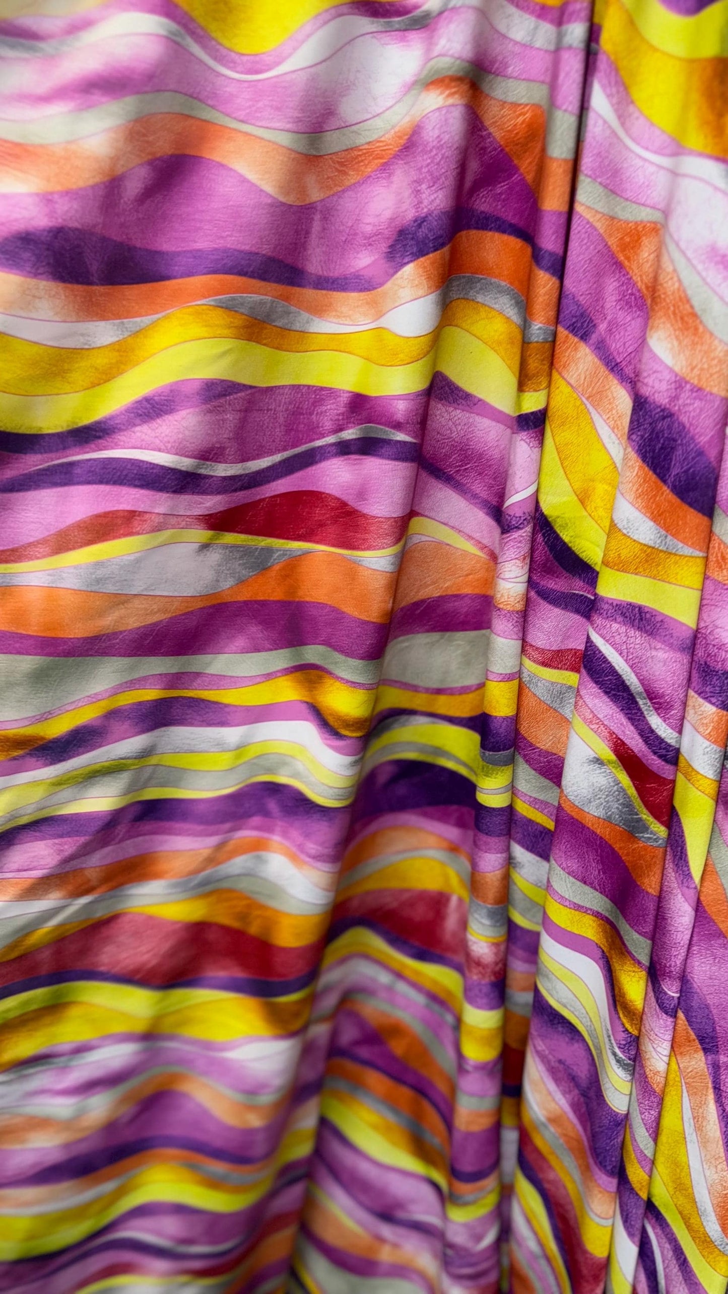 New abstract Wavy design print on great quality of Nylon spandex 4-way stretch 58/60” Sold by the YD. Ships worldwide from Los Angeles CA