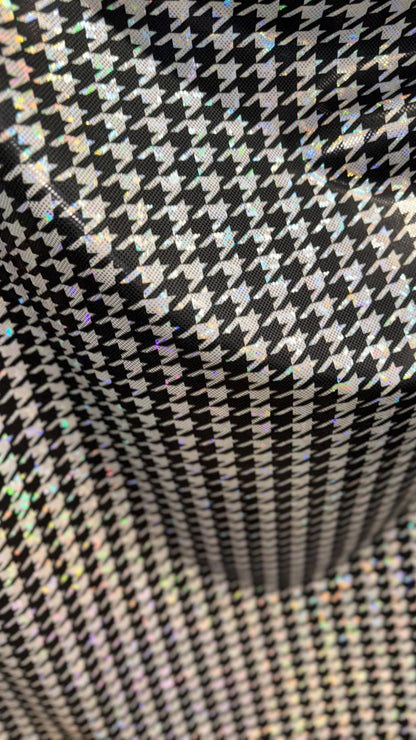 Houndstooth design on Shattered Glass metallic hologram nylon spandex White/Silver/Black  4-way stretch 58/60" Sold by the YD.
