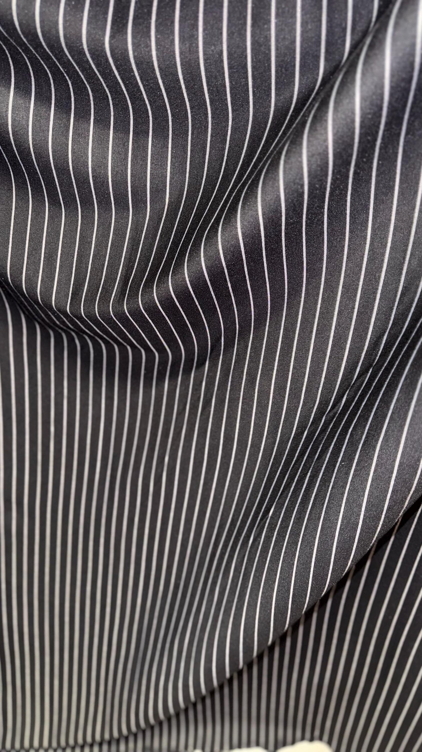 Pin stripes on spandex ponte de Roma fabric  2-way stretch 58/60” Sold by the YD. Ships worldwide from Los Angeles California USA.