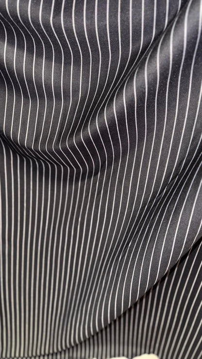 Pin stripes on spandex ponte de Roma fabric  2-way stretch 58/60” Sold by the YD. Ships worldwide from Los Angeles California USA.
