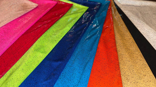New Iridescent Pebbles hologram foil metallic nylon spandex 4-way stretch 58/60” Sold by the YD. Ships worldwide from Los Angeles CA USA