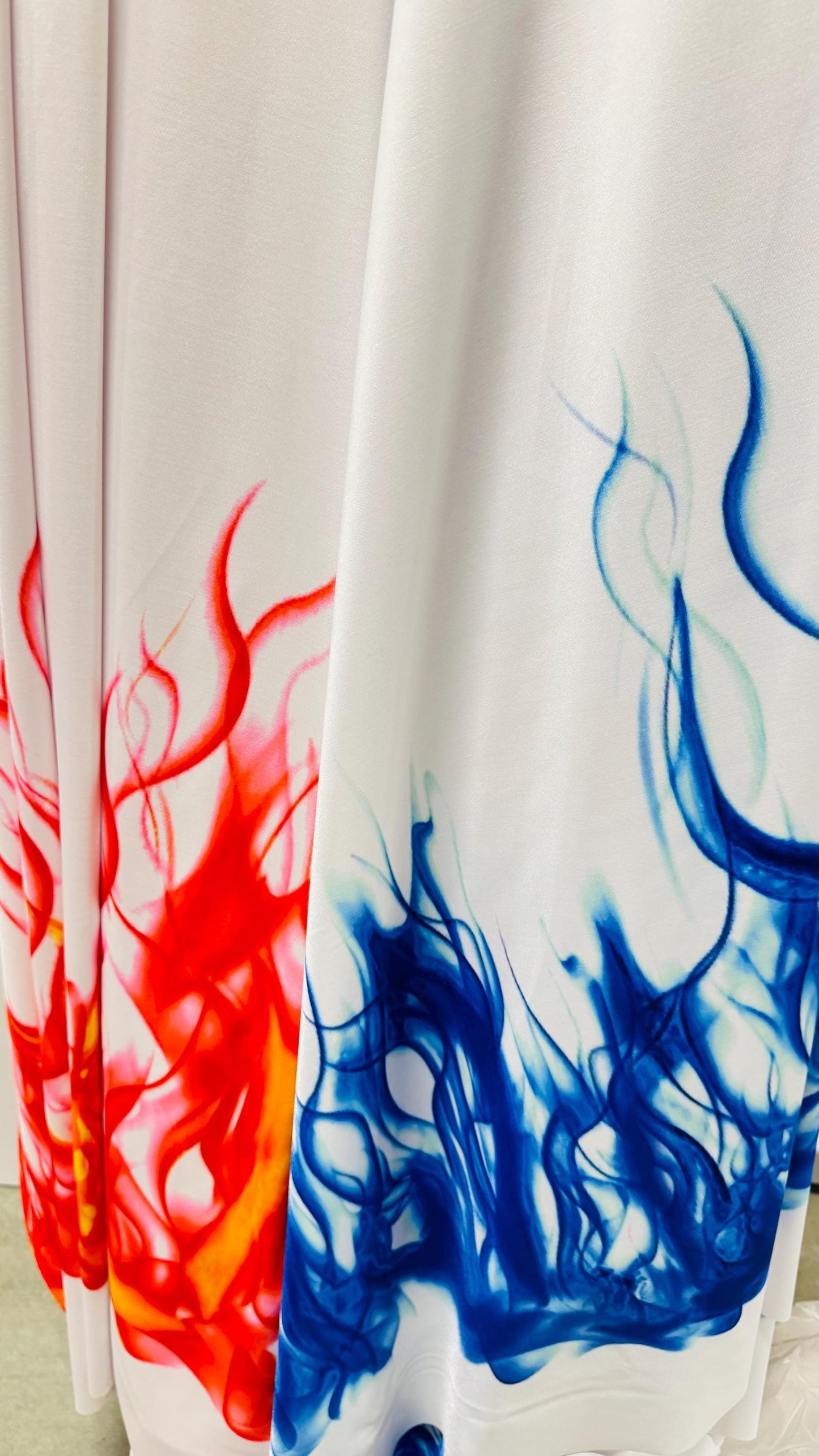 Flames design Black/Fire and White/Sapphire print on great quality of nylon spandex 4-way stretch 58/60” Sold by the YD. Ships Worldwide