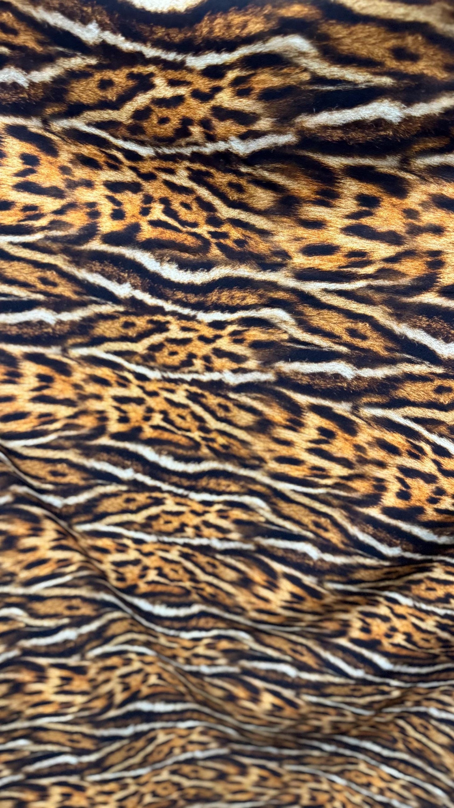 New Exotic Leopard animal print brown/Gold 4way stretch Nylon spandex 58/60" Sold by the YD. Ships worldwide from Los Angeles California.