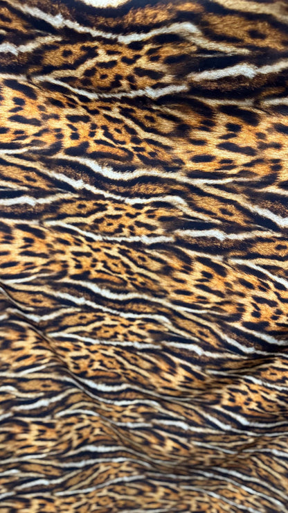 New Exotic Leopard animal print brown/Gold 4way stretch Nylon spandex 58/60" Sold by the YD. Ships worldwide from Los Angeles California.