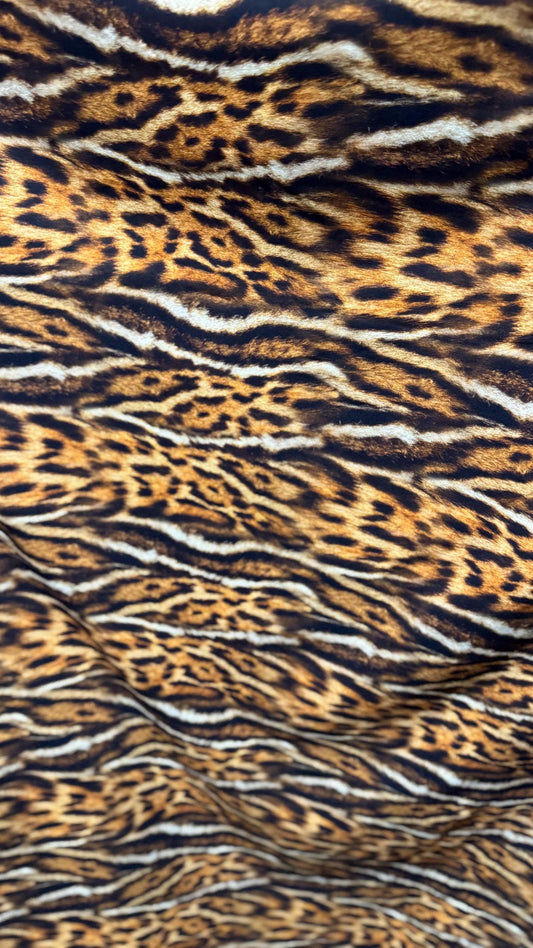 New Exotic Leopard animal print brown/Gold 4way stretch Nylon spandex 58/60" Sold by the YD. Ships worldwide from Los Angeles California.