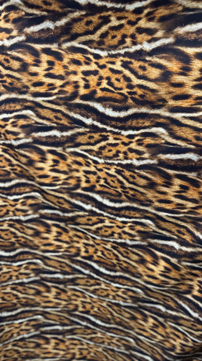 New Exotic Leopard animal print brown/Gold 4way stretch Nylon spandex 58/60" Sold by the YD. Ships worldwide from Los Angeles California.