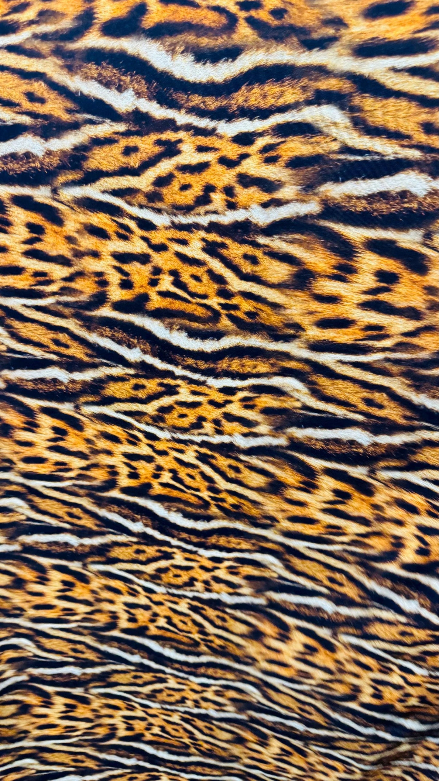 New Exotic Leopard animal print brown/Gold 4way stretch Nylon spandex 58/60" Sold by the YD. Ships worldwide from Los Angeles California.