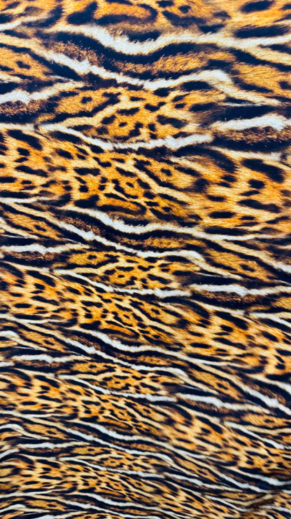 New Exotic Leopard animal print brown/Gold 4way stretch Nylon spandex 58/60" Sold by the YD. Ships worldwide from Los Angeles California.