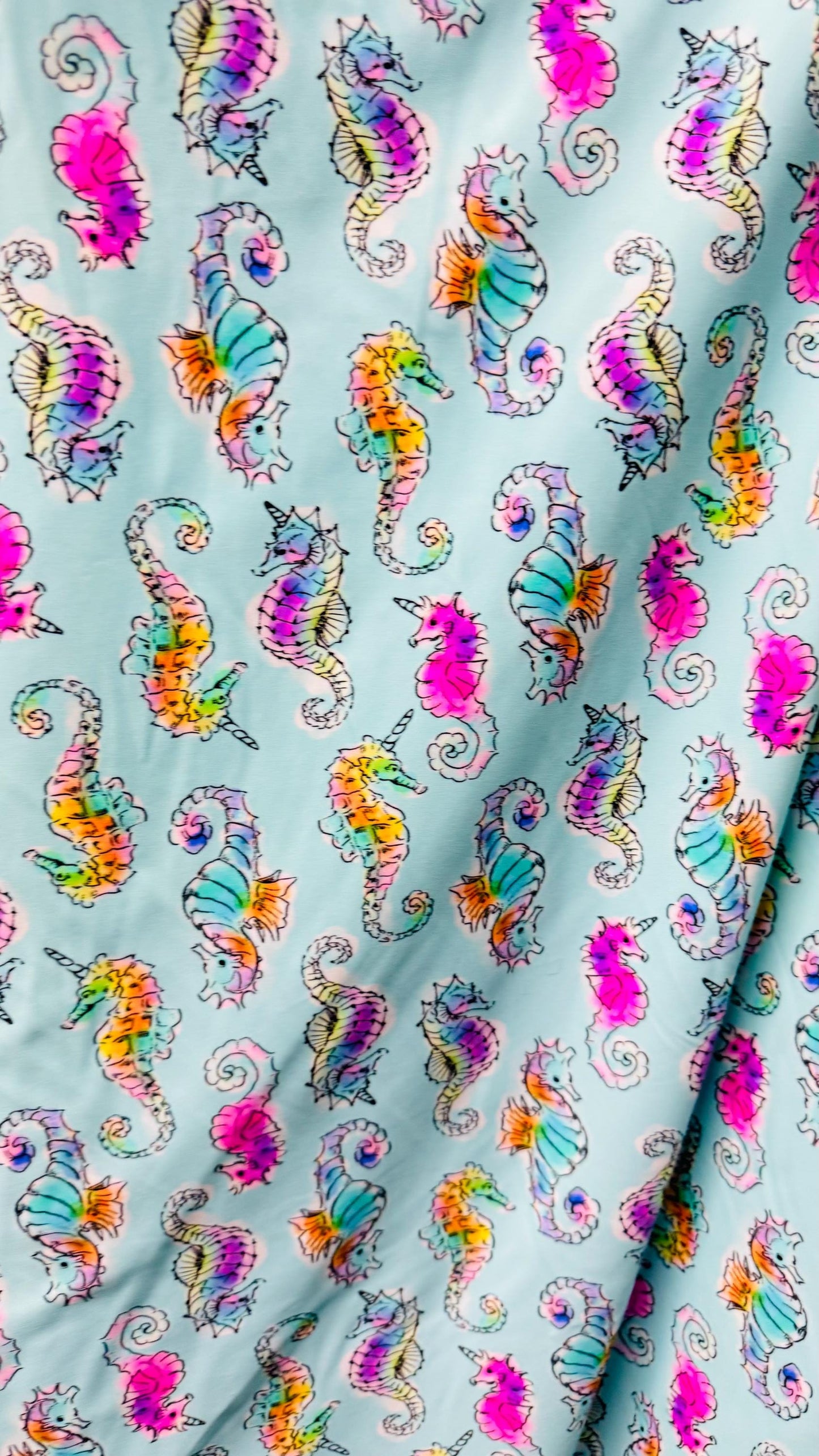 Sea Horse design Aqua Multi  print on great nylon spandex 4way stretch 58/60" Sold by the yd. Ships worldwide from Los Angeles California