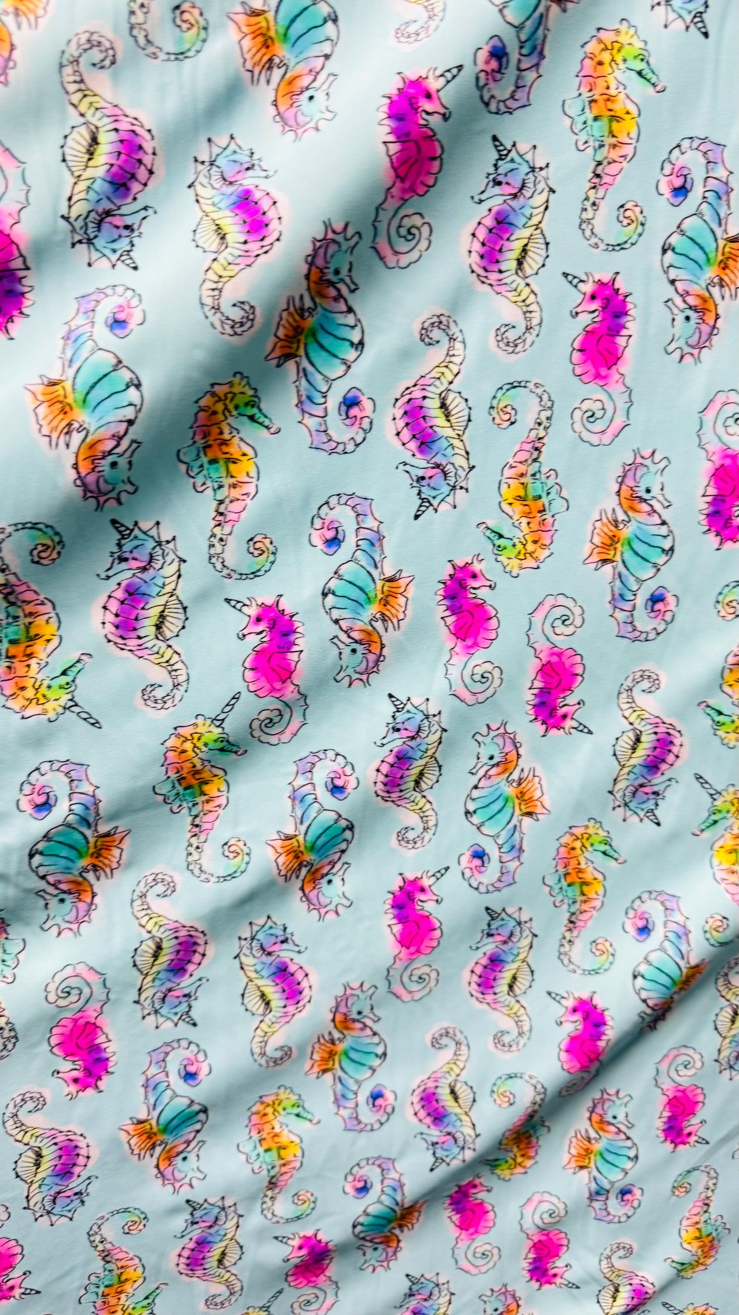Sea Horse design Aqua Multi  print on great nylon spandex 4way stretch 58/60" Sold by the yd. Ships worldwide from Los Angeles California