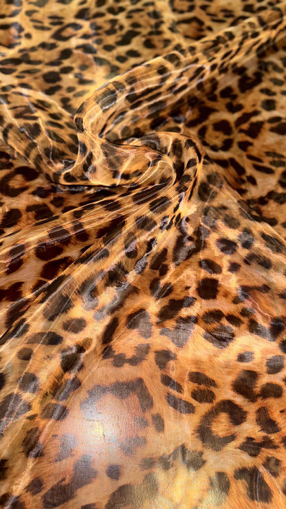 New Exotic Leopard design print on great quality of Mirror Silky Organza non stretch 58/60” Sold by the YD. Ships worldwide from LA CA