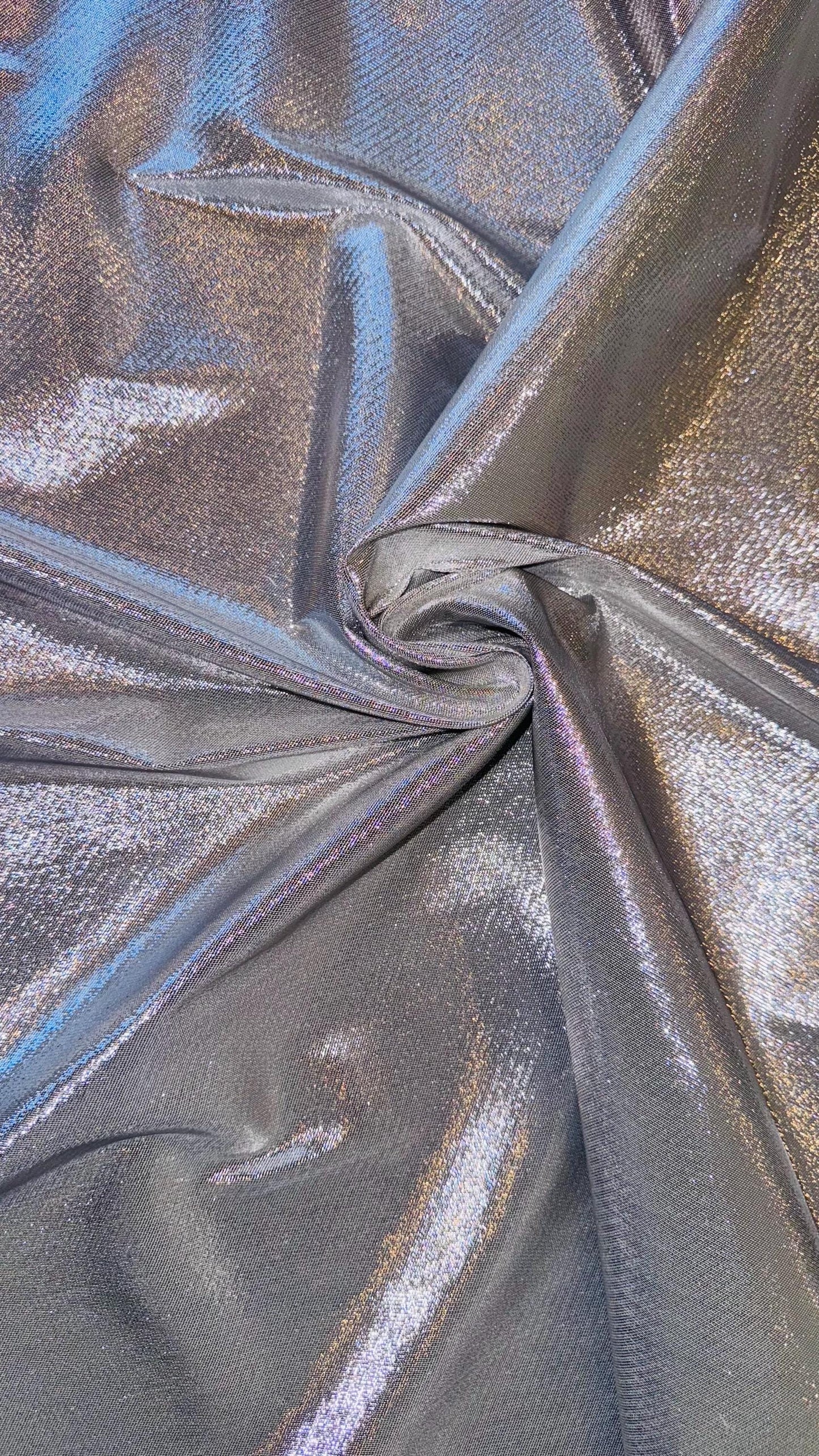 Silver Metallic Lame Lurex stretch super shiny  4-way stretch 45/46” Sold by the YD. Ships Worldwide from Los Angeles California USA.