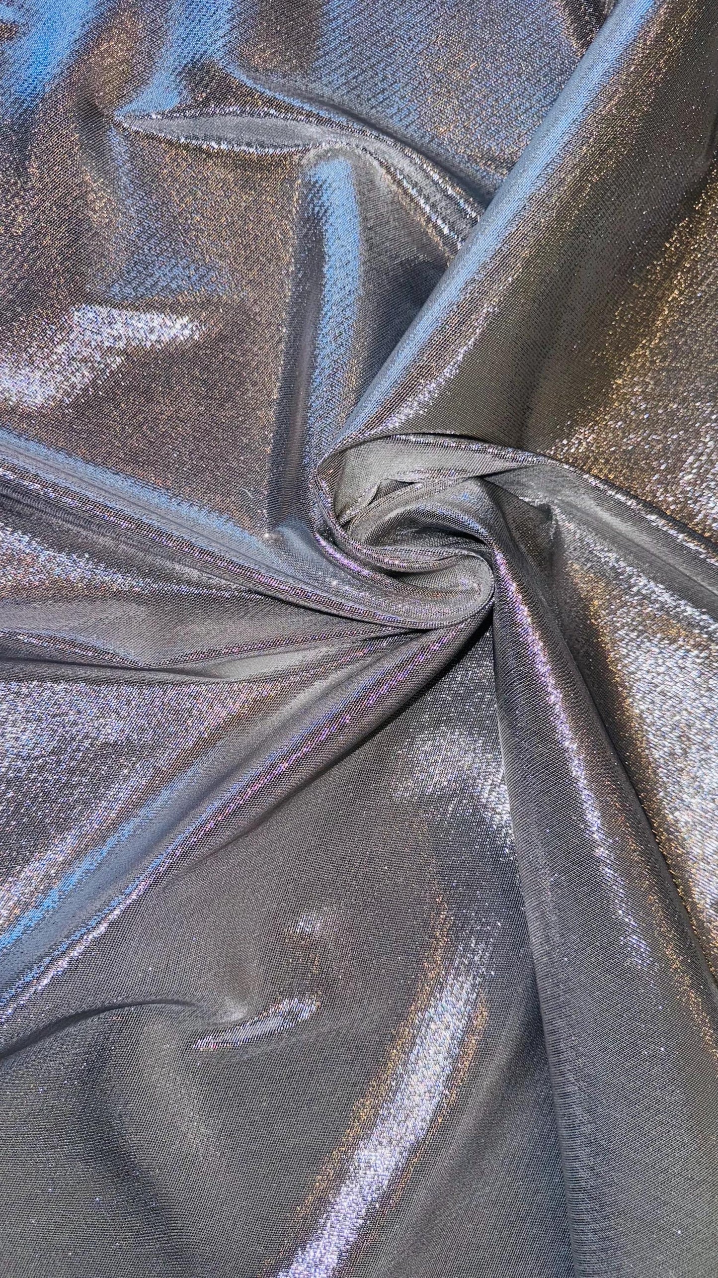 Silver Metallic Lame Lurex stretch super shiny  4-way stretch 45/46” Sold by the YD. Ships Worldwide from Los Angeles California USA.
