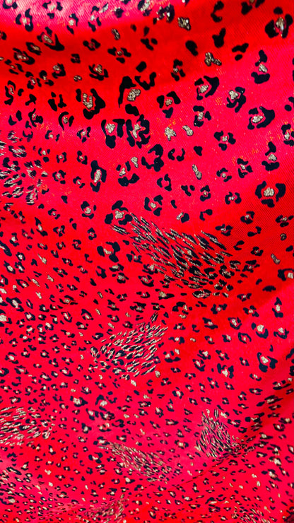 NEW Jaguar design flocking on hologrm broken glasss metallic 4way strech nylon spandex sold by the yd. Ships from Los Angeles California USA