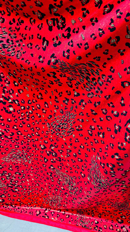 NEW Jaguar design flocking on hologrm broken glasss metallic 4way strech nylon spandex sold by the yd. Ships from Los Angeles California USA