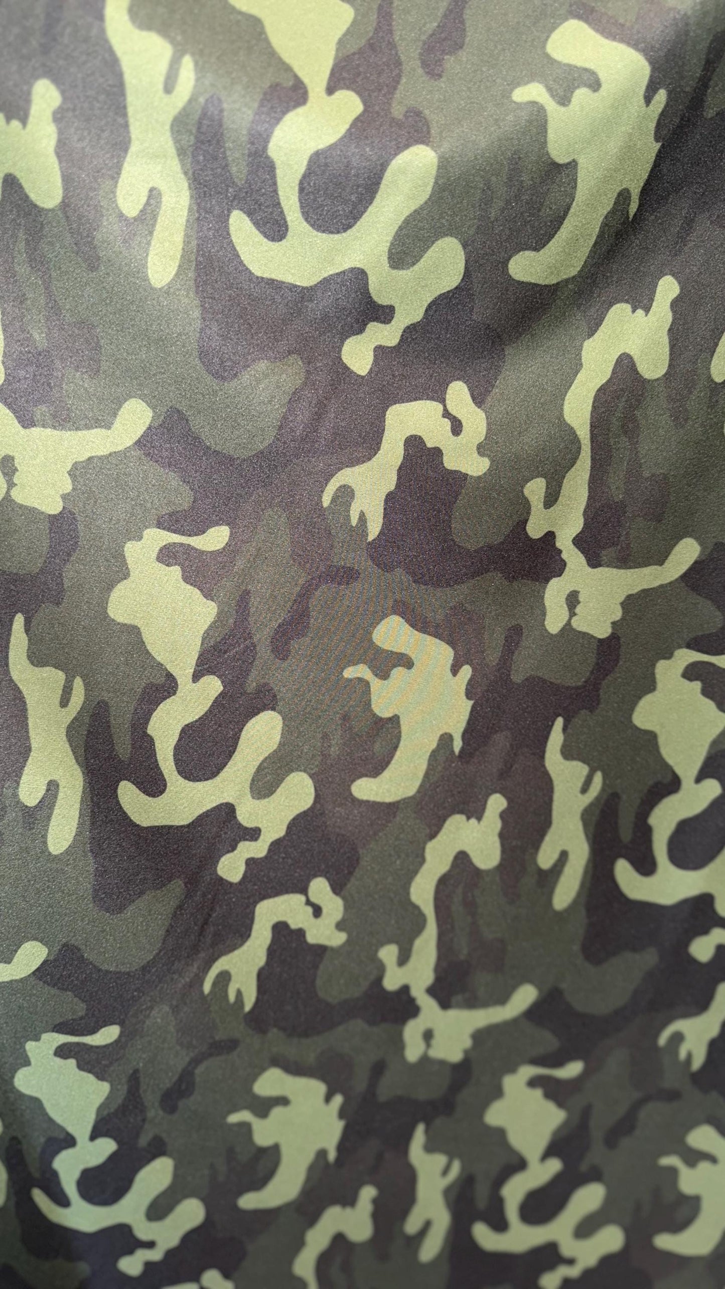 Camouflage design on great quality nylon spandex print 4way Stretch 64/65" Sold by the yd. Ships worldwide from Los Angeles California USA.