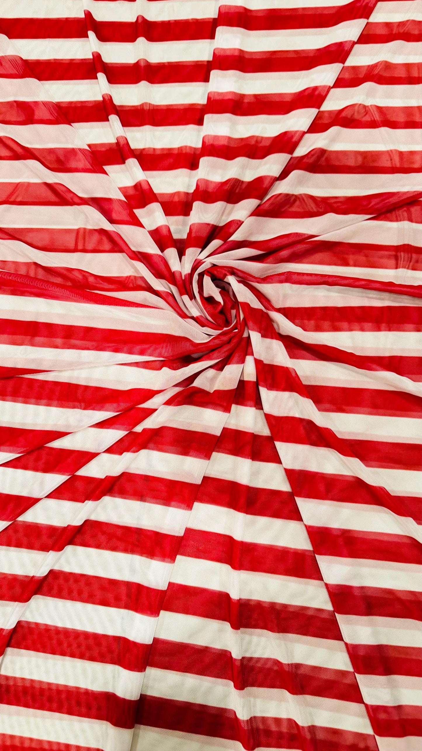 Stripes design 1” size Red/White print on power mesh 4-way stretch 58/60” Sold by the YD. Ships Worldwide from Los Angeles California USA.