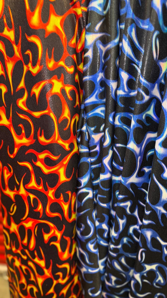 Hot flame design on Iridescent Metallic nylon spandex 4way stretch 58/60" Sold by the YD. Ships worldwide from Los Angeles California USA.