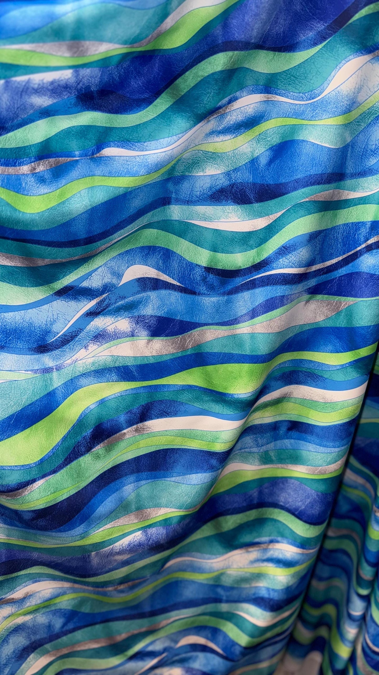 New abstract Wavy design print on great quality of Nylon spandex 4-way stretch 58/60” Sold by the YD. Ships worldwide from Los Angeles CA
