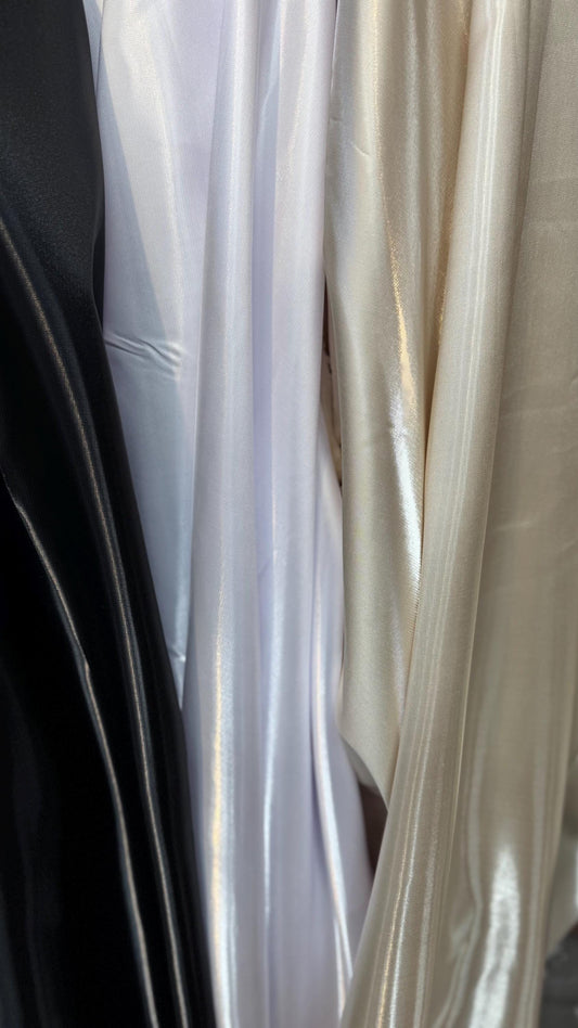 New  Luxury super shiny Cristal satin non stretch 58/60” Sold by the YD. Ships worldwide from Los Angeles California USA.