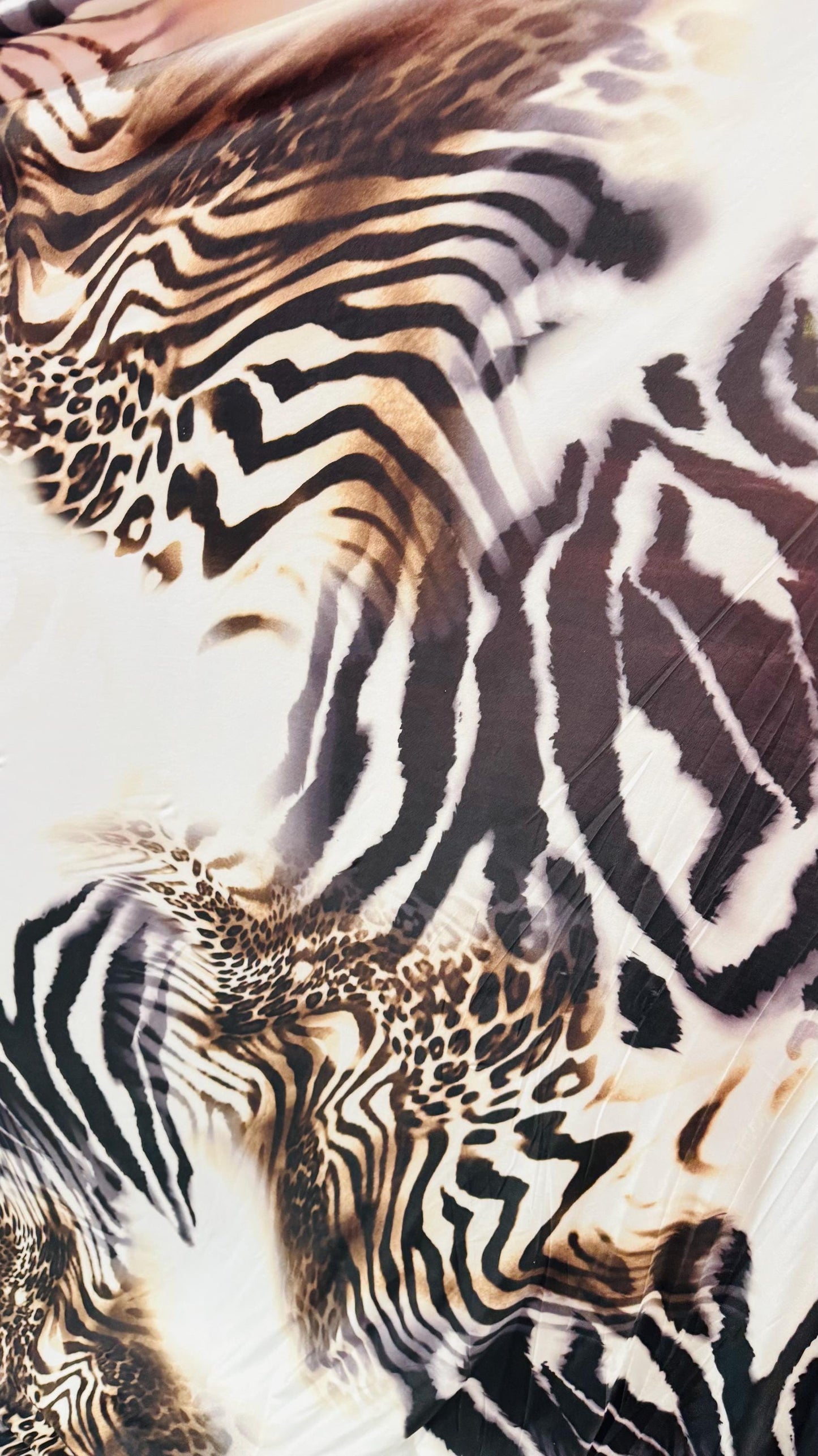 New Safari design Taupe/Brown print on poly spandex 4way stretch 58/60" Sold by the yd. Ships worldwide from Los Angeles California USA.