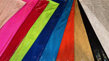 New Iridescent Pebbles hologram foil metallic nylon spandex 4-way stretch 58/60” Sold by the YD. Ships worldwide from Los Angeles CA USA