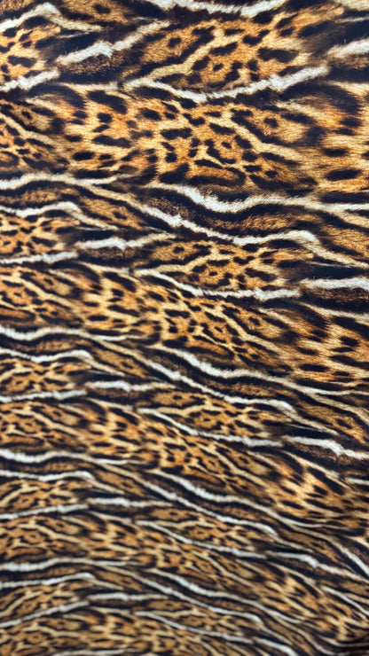 New Exotic Leopard animal print brown/Gold 4way stretch Nylon spandex 58/60" Sold by the YD. Ships worldwide from Los Angeles California.