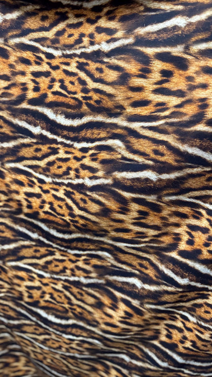New Exotic Leopard animal print brown/Gold 4way stretch Nylon spandex 58/60" Sold by the YD. Ships worldwide from Los Angeles California.