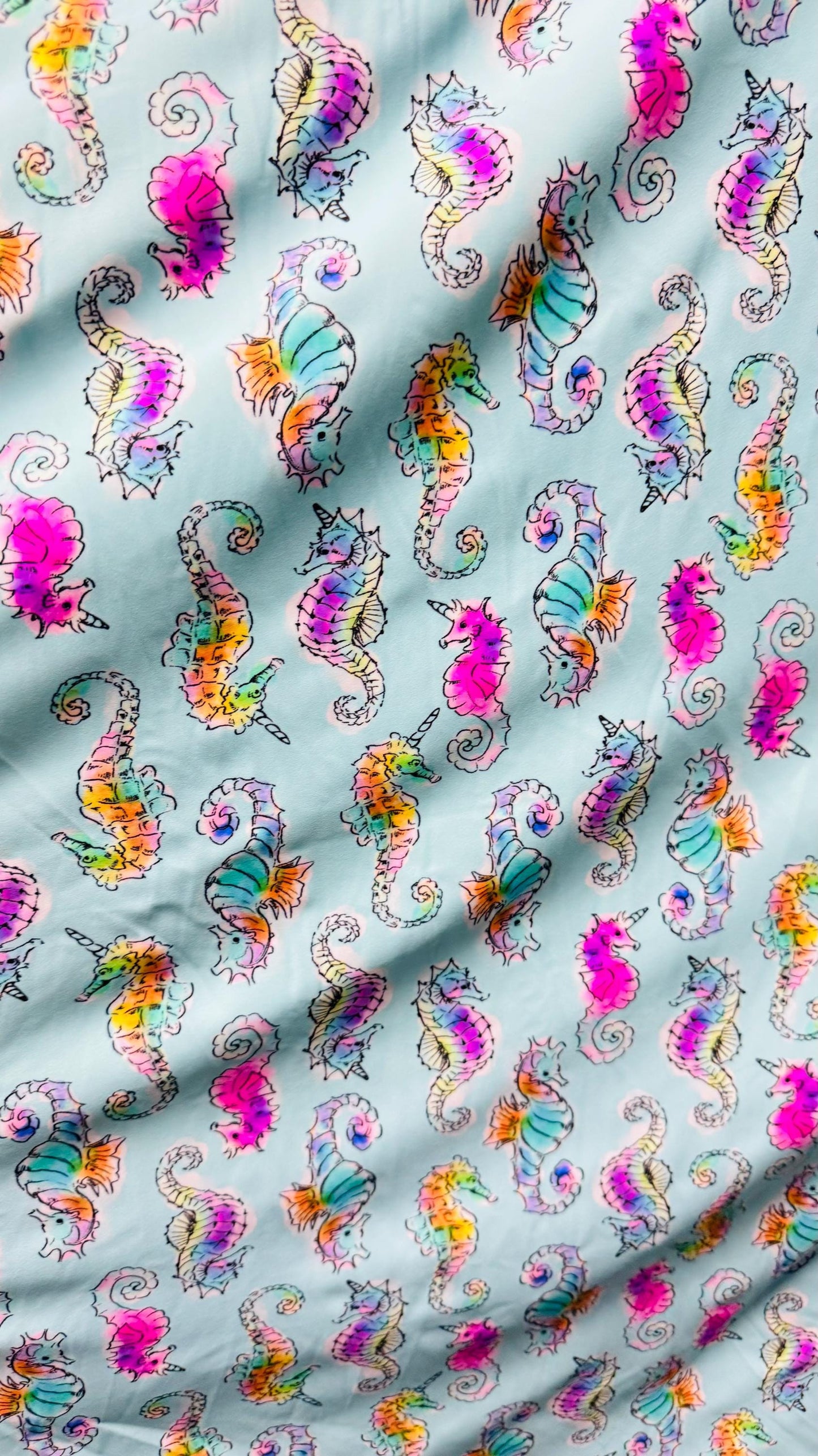 Sea Horse design Aqua Multi  print on great nylon spandex 4way stretch 58/60" Sold by the yd. Ships worldwide from Los Angeles California