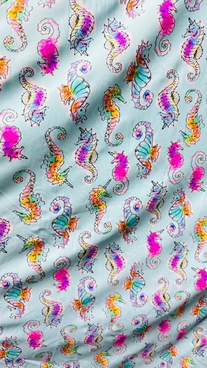 Sea Horse design Aqua Multi  print on great nylon spandex 4way stretch 58/60" Sold by the yd. Ships worldwide from Los Angeles California
