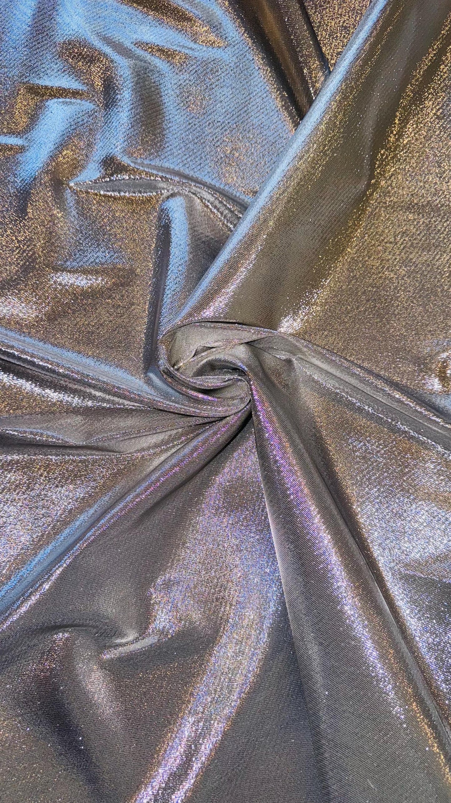 Silver Metallic Lame Lurex stretch super shiny  4-way stretch 45/46” Sold by the YD. Ships Worldwide from Los Angeles California USA.