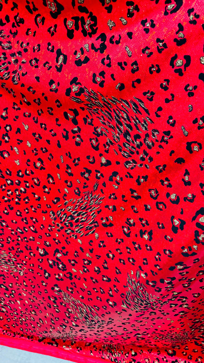 NEW Jaguar design flocking on hologrm broken glasss metallic 4way strech nylon spandex sold by the yd. Ships from Los Angeles California USA