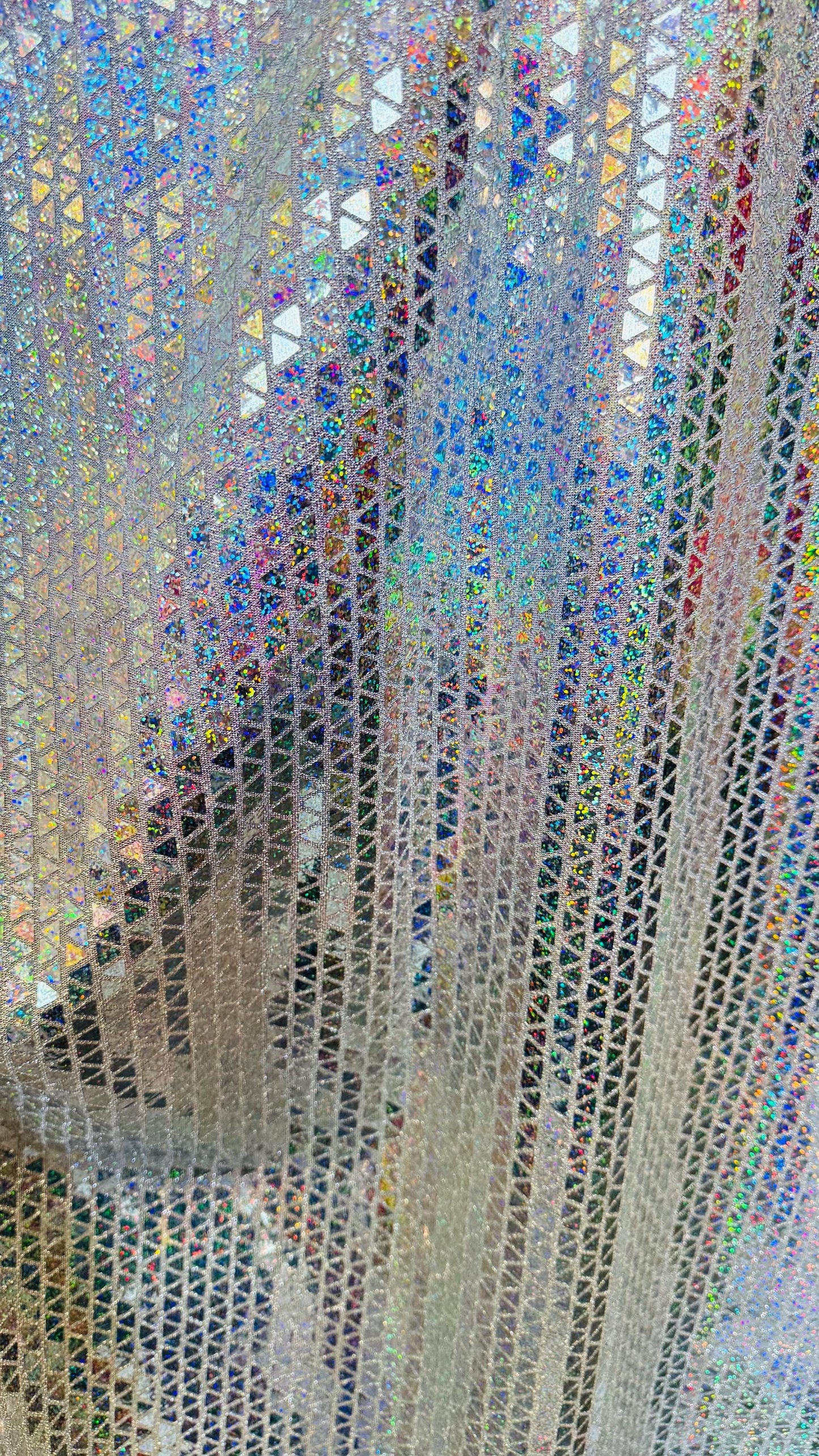 New Triangle Geometric Hologram sequins on metallic base non stretch 44/45" Sold by the YD. Ships worldwide from Los Angeles California USA
