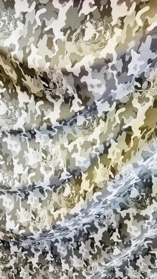 Camouflage design with skulls on Microfiber spandex waterproof 2-way Stretch 58/60" Sold by the yd. Ships worldwide from Los Angeles CA