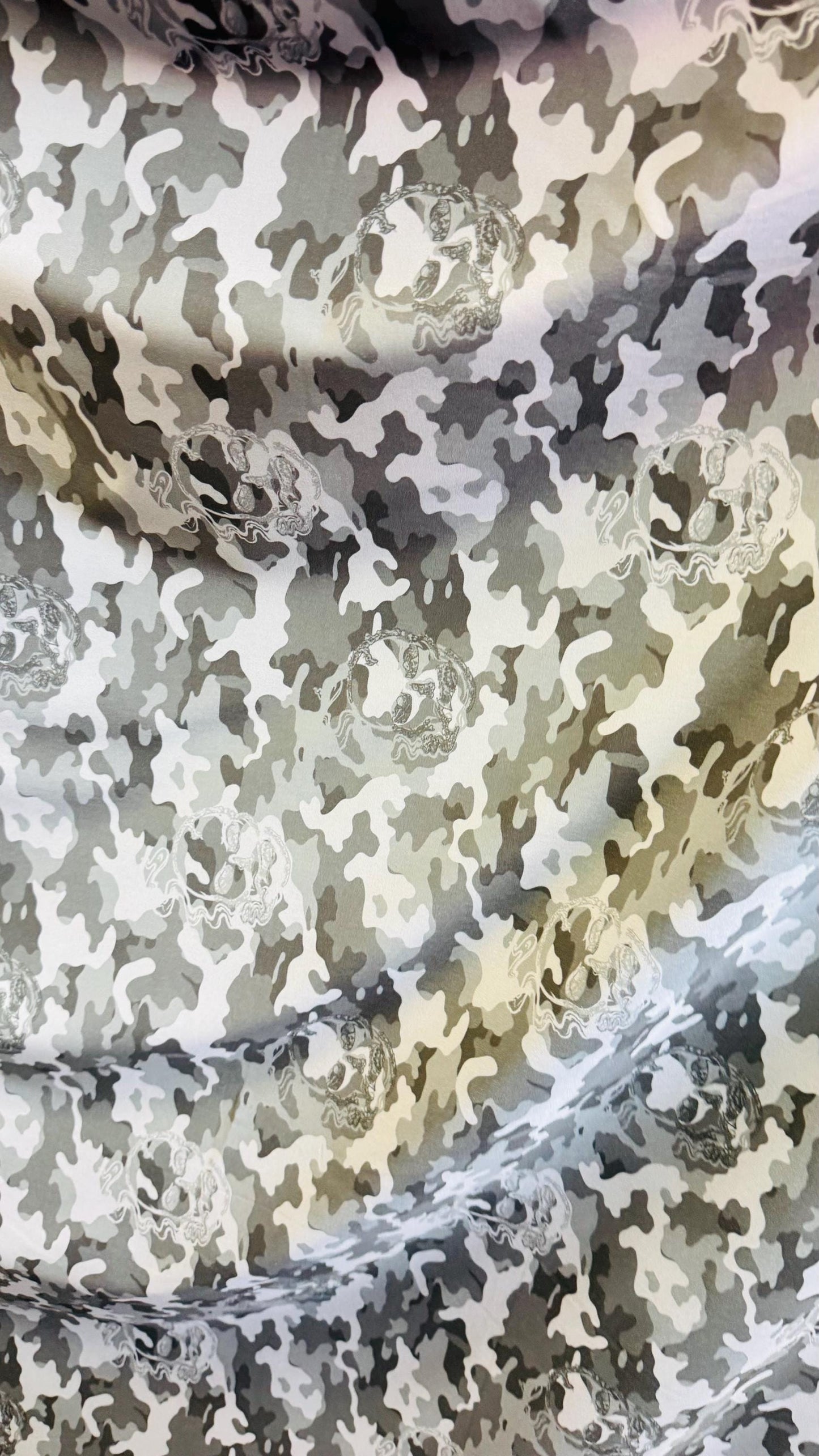 Camouflage design with skulls on Microfiber spandex waterproof 2-way Stretch 58/60" Sold by the yd. Ships worldwide from Los Angeles CA
