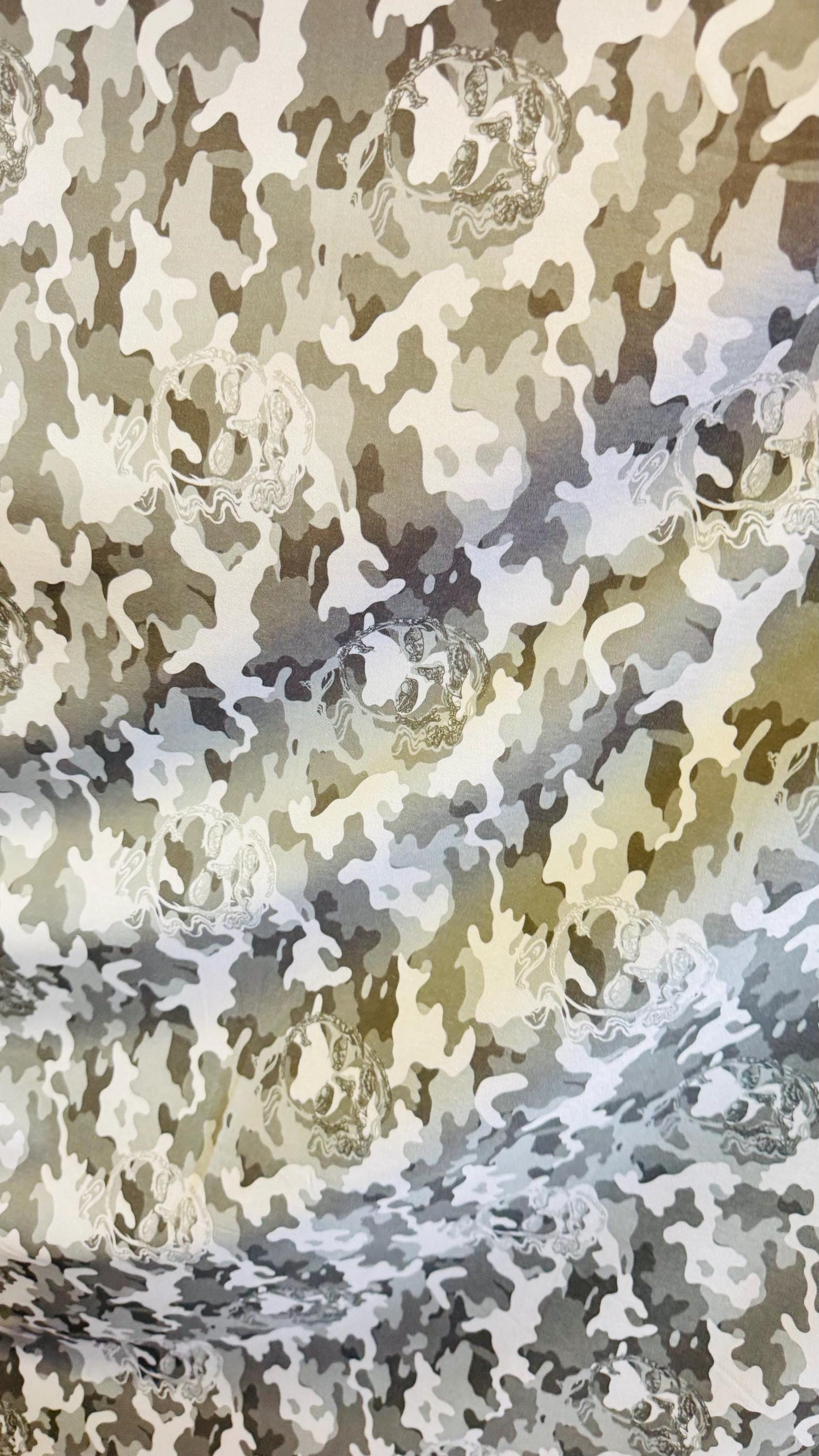 Camouflage design with skulls on Microfiber spandex waterproof 2-way Stretch 58/60" Sold by the yd. Ships worldwide from Los Angeles CA