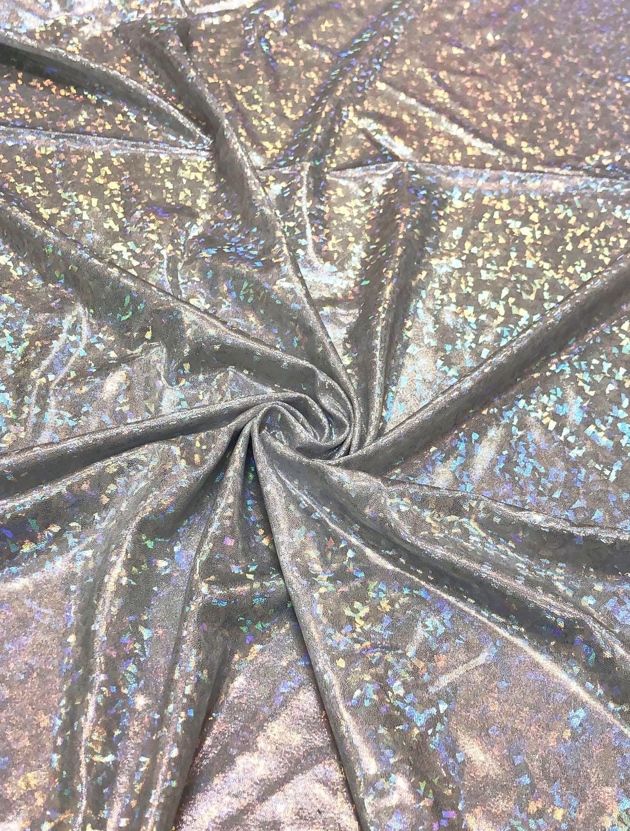 New Shattered glass with foggy foil Hologram metallic nylon spandex 4way stretch 58/60" Sold by the YD. Ships worldwide from Los Angeles CA