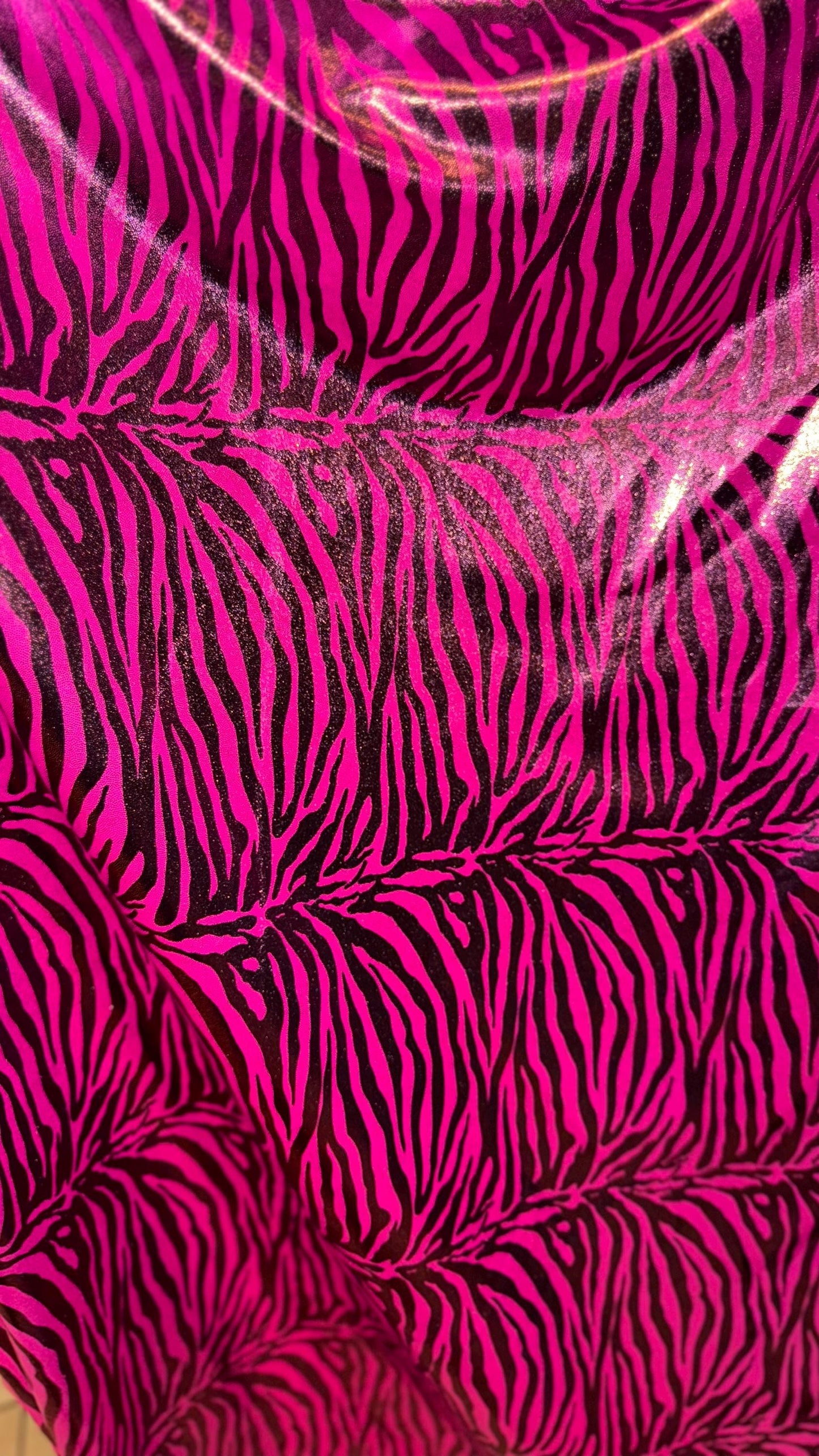 Exotic Zebra design metallic nylon spandex with all over foil 4-way stretch 58/60” Sold by the YD. Ships worldwide from Los Angeles Californ