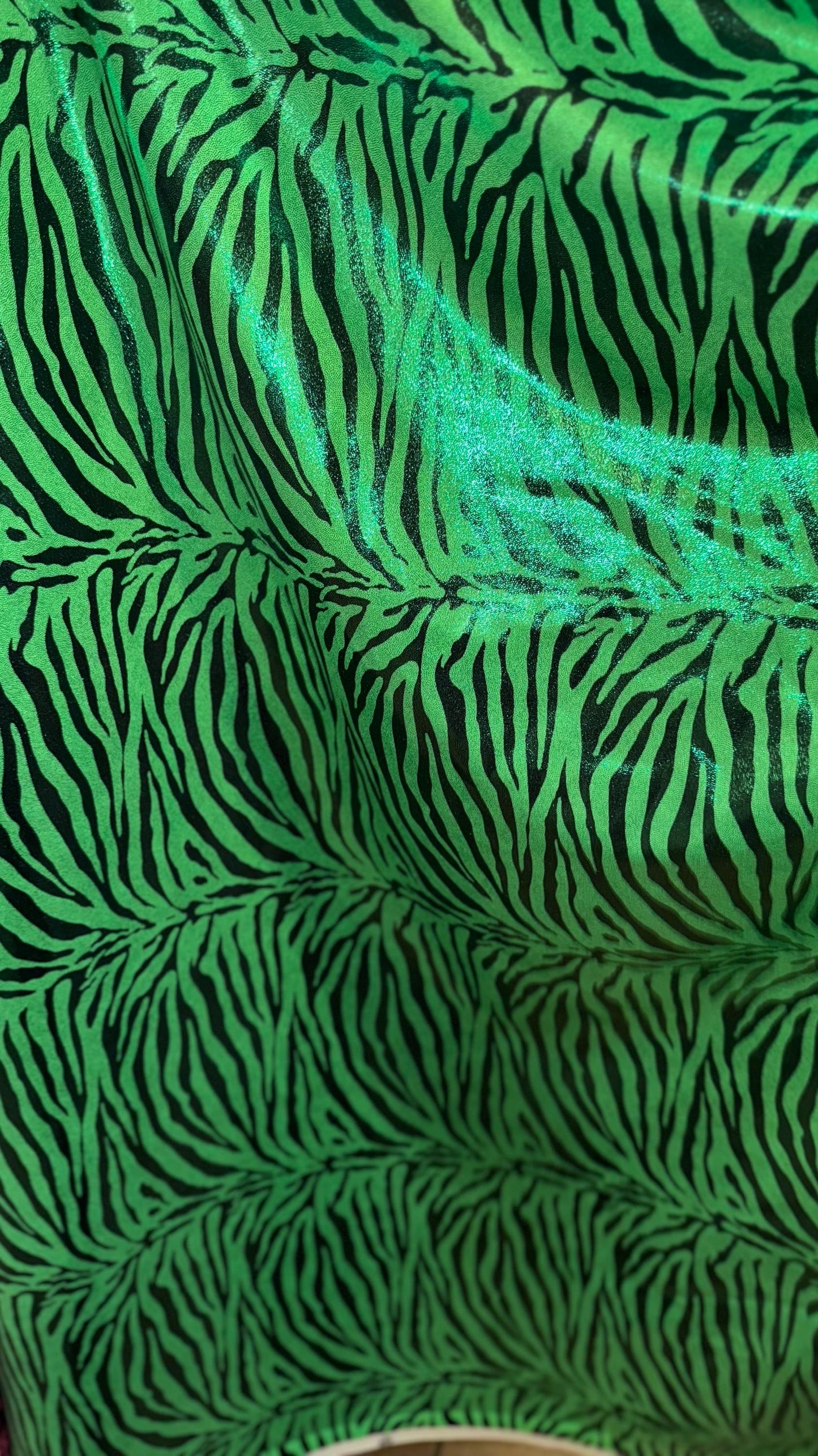 Exotic Zebra design metallic nylon spandex with all over foil 4-way stretch 58/60” Sold by the YD. Ships worldwide from Los Angeles Californ