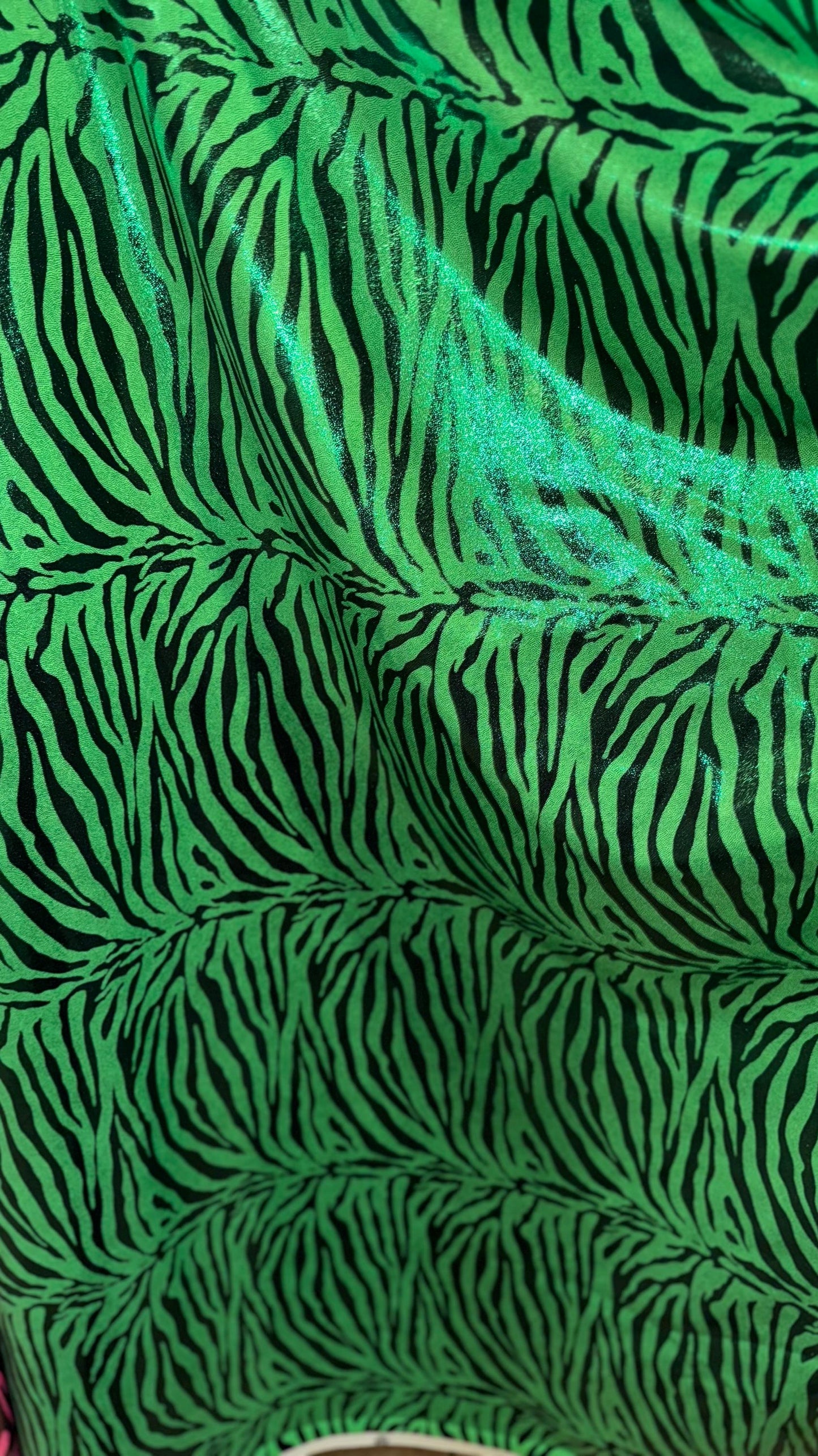 Exotic Zebra design metallic nylon spandex with all over foil 4-way stretch 58/60” Sold by the YD. Ships worldwide from Los Angeles Californ