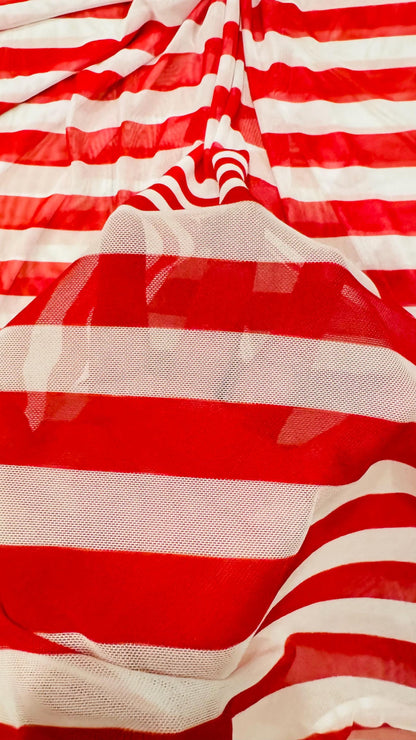 Stripes design 1” size Red/White print on power mesh 4-way stretch 58/60” Sold by the YD. Ships Worldwide from Los Angeles California USA.