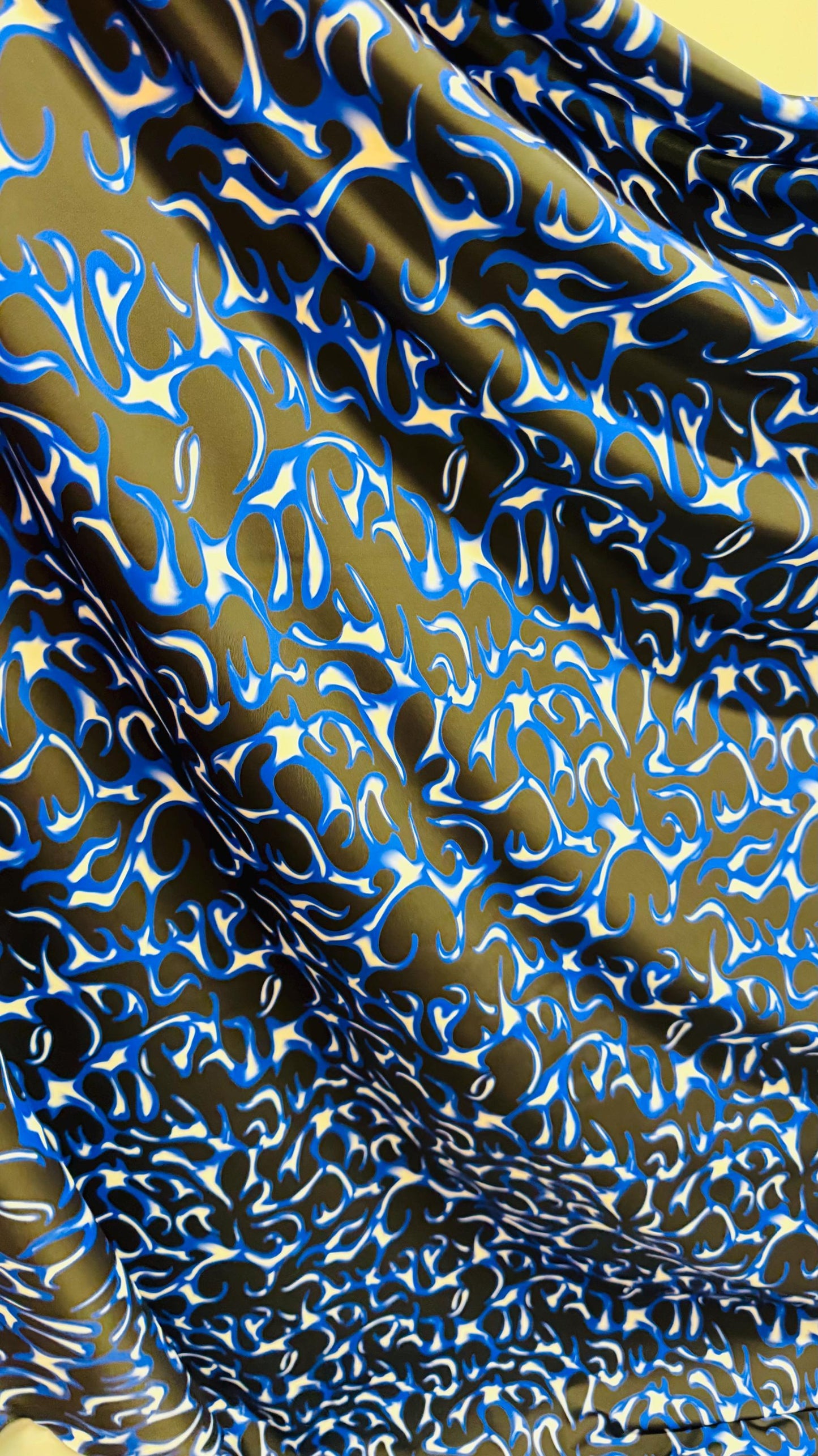 Hot flame design Sapphire/Black print on heavy nylon spandex 4way stretch 58/60" Sold by the YD. Ships worldwide from Los Angeles California