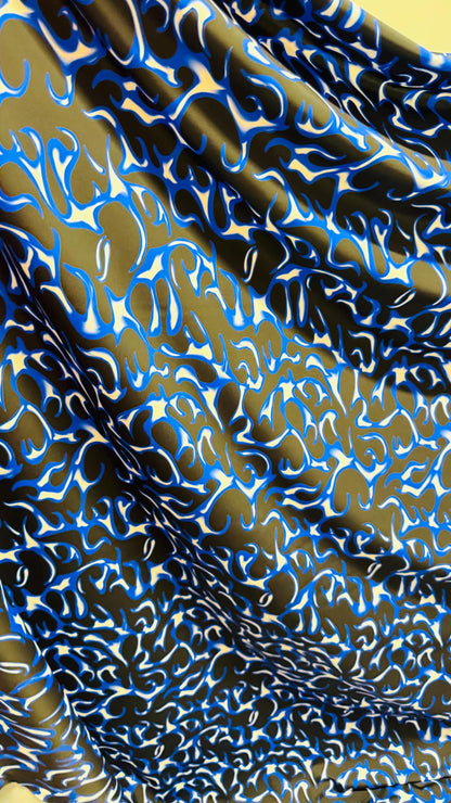 Hot flame design Sapphire/Black print on heavy nylon spandex 4way stretch 58/60" Sold by the YD. Ships worldwide from Los Angeles California