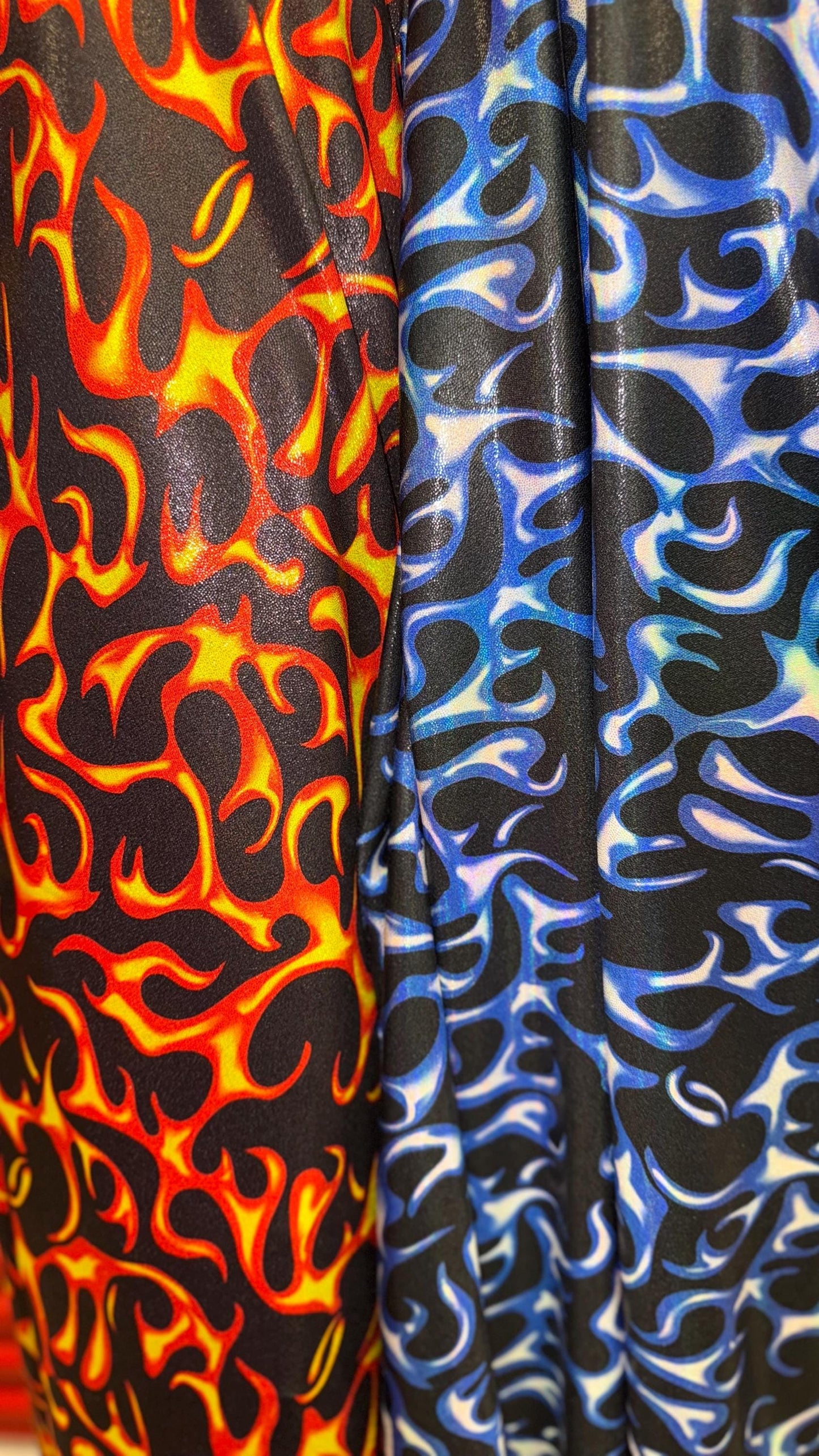 Hot flame design on Iridescent Metallic nylon spandex 4way stretch 58/60" Sold by the YD. Ships worldwide from Los Angeles California USA.