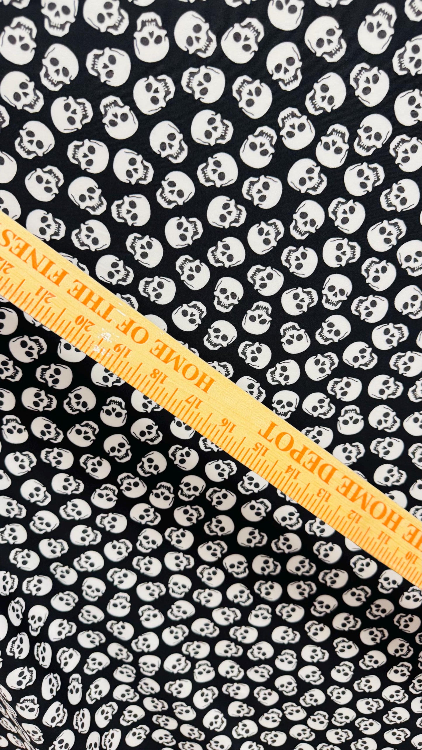 Skull Halloween design Black/White  print  on nylon spandex 4way stretch 58/60" sold by the yd. Ships worldwide from Los Angeles California