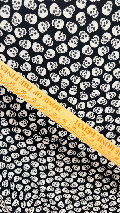Skull Halloween design Black/White  print  on nylon spandex 4way stretch 58/60" sold by the yd. Ships worldwide from Los Angeles California